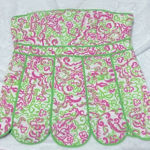 Cute Lilly top, gently used. Pinks, lime, a lot of detail . Zips down the side.